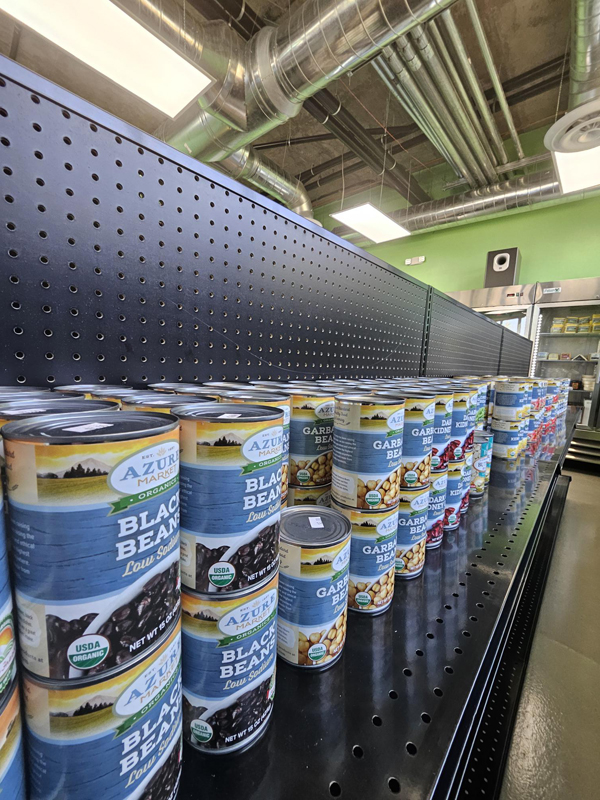 Cans of beans on shelf Cans of beans on shelf